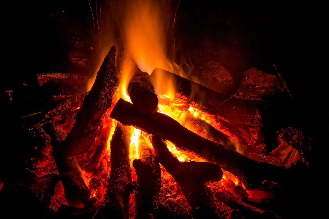 An oak fire burning down to coals at night